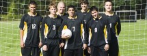 soccer players wearing uniforms