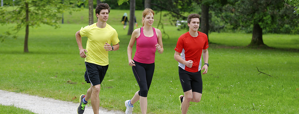 Three athletes jogging