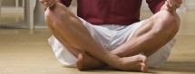 Smiling Man in Lotus Position